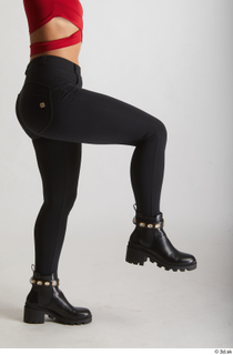  Zuzu Sweet  1 black boots black trousers casual dressed flexing leg side view 0004.jpg